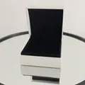 White lychee pattern leather jewelry box with black velvet lining and logo detail - Bracelet Gift Box