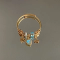 Golden woven open bangle with blue heart gemstone and sparkling crown charms - Exquisite Beaded Style (B1089—2)