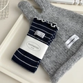 Dark blue striped knit socks featuring elegant ruffle cuffs and a minimalist woven label - Navy Blue
