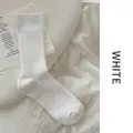 Vertical ribbed cotton crew socks in minimalist white color for casual wear - One Size / White