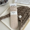 Beige cotton socks with ruffle trim and knit texture on minimalist desk background - One Size / Oatmeal