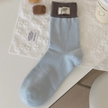 Light blue crew socks with dark coffee ribbed cuff and cute bear muse embroidery label - Light Blue