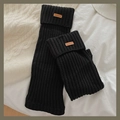 Jambières noires en maille épaisse avec écusson en cuir vintage et texture côtelée - Taille unique / Noir