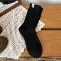 Chaussettes rétro en laine noire avec étiquette tissée et texture en maille côtelée - Bord Roulé Noir