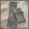 Gray knitted leg warmers in ribbed texture with premium leather label detail - One Size / Light Gray