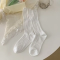 White knit ballet style crew socks with cable pattern and ruffled elastic cuffs - White