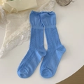Sky blue knit mid-calf socks with cable texture and delicate ruffle hem details - Aquamarine