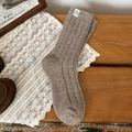 Brown wool knit crew socks featuring vertical ribbed texture and a white woven label - One Size / Wide Stripe Khaki