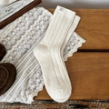 Off-white ribbed knit wool socks for women with a side label accent in warm lighting - One Size / Wide Stripe Cream