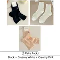 Set of three pairs of mesh hollow knit mid-calf socks in black, cream, and soft pink - One Size / 3 Pairs (Black + Milk White + Milk Pink)