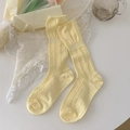 Sweet ballet style pale yellow knee-high socks with cable knit and ruffled cuffs - Milky Yellow