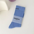 Sky blue cotton crew socks with ribbed knit texture and minimalist paper packaging - Light Blue (1 Pair)