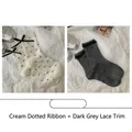 Set of two pairs of socks featuring cream polka dots and dark grey lace bow designs - 2 Pairs: Cream Polka Dot Ribbon & Dark Grey Lace (2515花边爱心系)