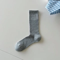Grey vertical ribbed mid-calf socks made of soft cotton in a flat lay minimalist style - Light Gray