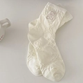 Creamy white crew socks with cute knitted bear patterns and embroidered patch details - Cream