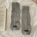 Light gray knitted leg warmers with vertical ribbed texture and a minimalist aesthetic - One Size / Light Gray