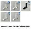 Fünf Paar gerippte Wadenstrümpfe in Creme, Schwarz und Weiß in einer Gitteranordnung - 5er Pack (Creme x2+Schwarz+Weiß x2)