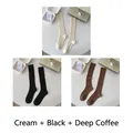 Vertical rib knit calf socks in cream, black, and dark coffee colors for women - One Size (35-40) / Cream + Black + Dark Coffee (3 Pairs)