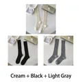Three-pack of ribbed knit crew socks in cream, black, and light grey marlard style - One Size (35-40) / Cream + Black + Light Grey (3 Pairs)