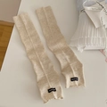 Beige ribbed knit leg warmer with branded patch and thin vertical stripe texture - One Size / Oatmeal