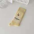 Calze a costine giallo pastello con ricamo a margherita e confezione in carta - Giallo Latte