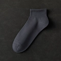 Single charcoal gray cotton sports ankle sock with elastic ribbed cuff and soft texture - One Size / Iron Grey