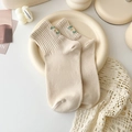 Creamy beige crew socks with green letter embroidery on ribbed cotton fabric - One Size / Beige