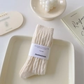 Thick cream cable knit mid-calf socks with textured ribbing in minimalist packaging - One Size / Beige