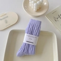 Soft lavender thick knit socks with ribbed texture for winter warmth, folded with label - One Size / Creamy Purple