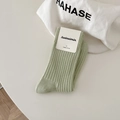 Muntgroene geribbelde kuitkousen van gekamd katoen in een minimalistische verpakking - Eén maat / Crème Groen
