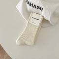 Creamy white ribbed mid-calf socks made of premium combed cotton with elegant texture - One Size / Cream