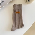 Deep beige ribbed knit mid-calf socks with vintage leather label accent - One Size / Khaki
