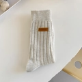 Light beige rib-knit mid-calf socks featuring a premium brown leather logo patch - One Size / Grey-Beige