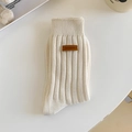 Off-white ribbed mid-tube cotton socks featuring a vintage leather label decoration - One Size / Beige