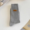 Grey chunky knit mid-calf socks with vintage brown leather patch detail and ribbed texture - One Size / Light Gray