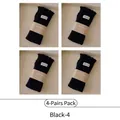 Pack of 4 black ribbed cotton crew socks with sweet ruffle trim and smiley brand label - 4 Pairs (Black x4)
