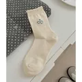Creamy white crew socks with ruffled cuffs and cherry embroidery in minimalist style - Cherry