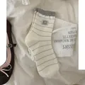 Striped Japanese style crew socks with grey bear patch and ruffle cuff in cream - One Size / Cream