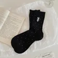 Black mid-calf cotton socks featuring white polka dots and a cute bear embroidery patch - Black