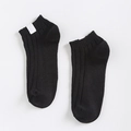 Short black cotton blend crew socks with ribbed cuffs and minimalist vertical stripe texture - One Size / Black