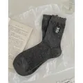 Dark grey cotton socks with white polka dots, bear embroidery, and wavy ruffled cuffs - Dark Gray