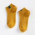 Ginger yellow cotton ankle socks with vertical ribbed knit and green decorative label - One Size / Turmeric