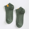 Deep green ribbed cotton ankle socks with a stylish orange fabric label detail - One Size / Dark Green