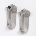Solid light grey cotton blend knit ankle socks with vertical ribbing and blue tag - One Size / Light Gray