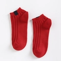 Vibrant red ribbed cotton ankle socks with a small dark woven label for women - One Size / Bright Red