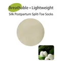Beige silk split-toe Tabi socks showing fine fabric texture and natural silk cocoons - One Size / Milky Green