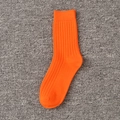 Vibrant orange ribbed crew socks made from soft cotton blend in a minimalist solid color style - Orange Red