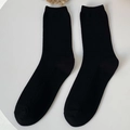 Calze da donna in cotone nero con trama a nido d'ape e bordi a coste elasticizzati - Nero