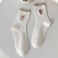 White cotton crew socks with brown cuff and cute bear embroidery in a ribbed knit style - One Size / White