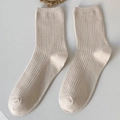 Beige cotton ribbed mid-calf socks with classic waffle knit texture for women - Coconut Milk